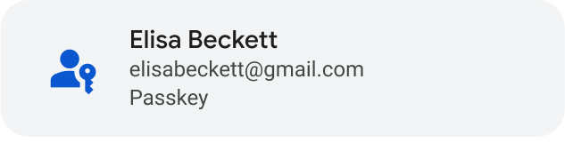 Un botón gris con un ícono genérico de una persona azul y una llave a la izquierda, y &quot;Elisa Beckett&quot; a la derecha, seguido de su correo electrónico y la palabra &quot;Llave de acceso&quot;.