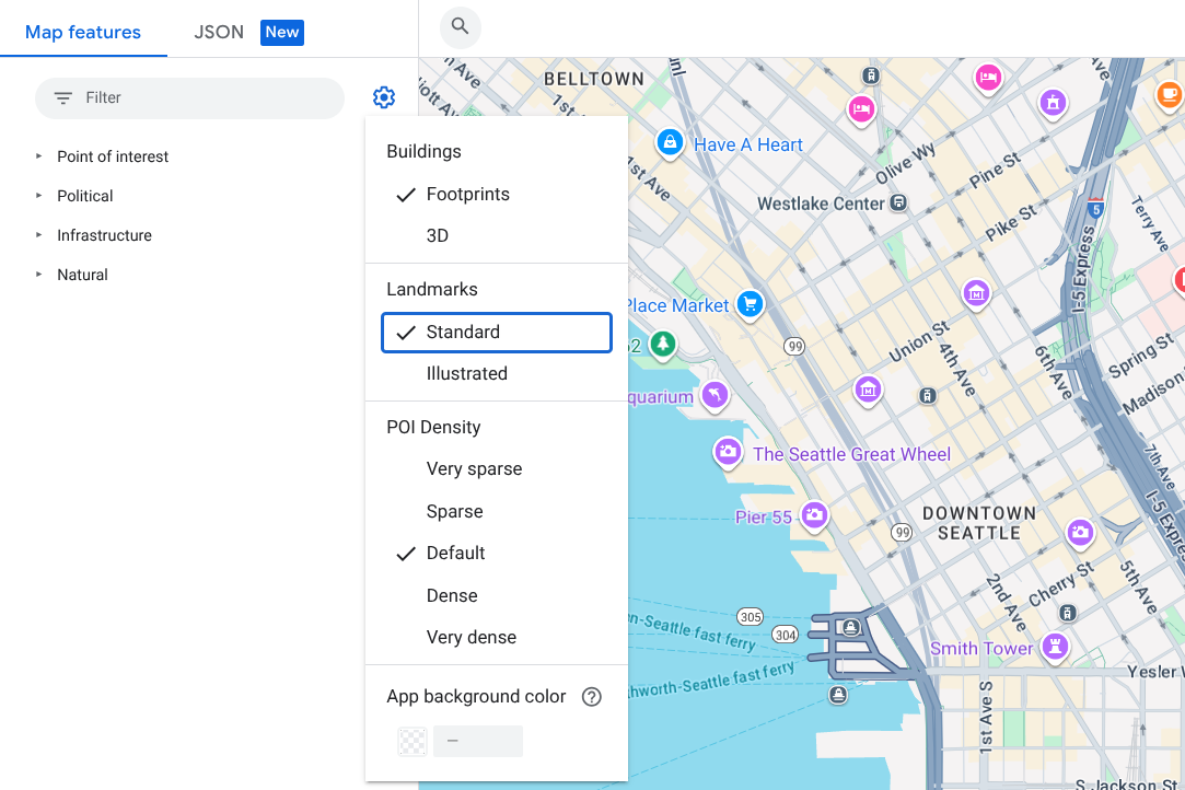 西雅图市中心的一张地图，其中显示了标准 Google 地图注点图标：泪珠形蓝绿色字形图标上有一个白色小图标，位于艺术博物馆和史密斯塔等地标上。