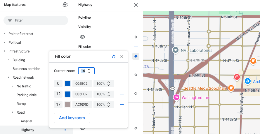 El mismo mapa de Seattle, pero con diseños de nivel de zoom agregados en los niveles 12 y 17 para que los colores de la autopista azul se desvanezcan en la superficie beige.
