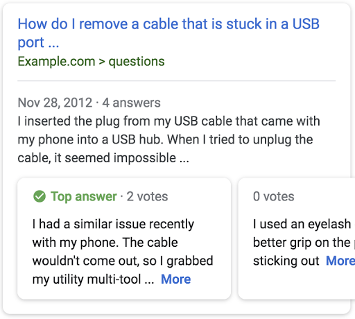 标题为“如何取出卡在 USB 端口中的数据线”的网页搜索结果示例，其中列出了该网页中的最佳回答。